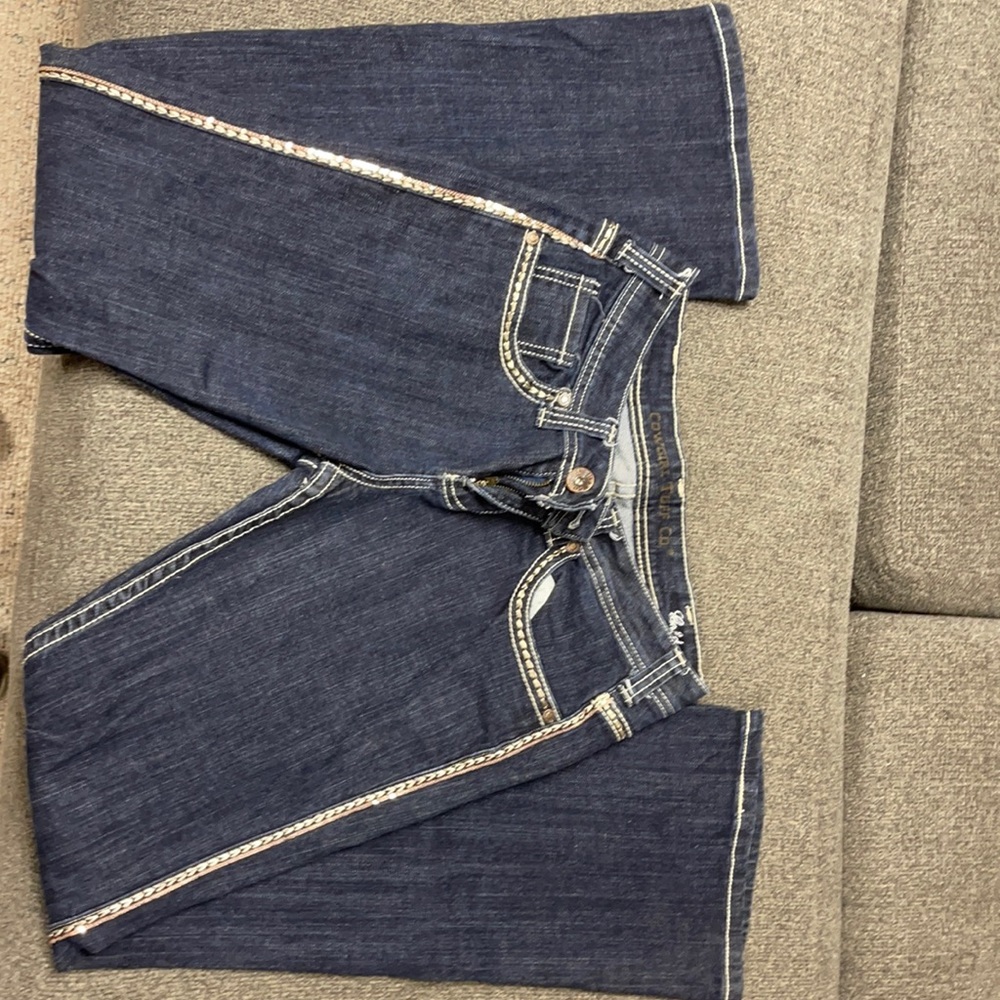 Sparkling Cowgirl Tuff Co jeans.